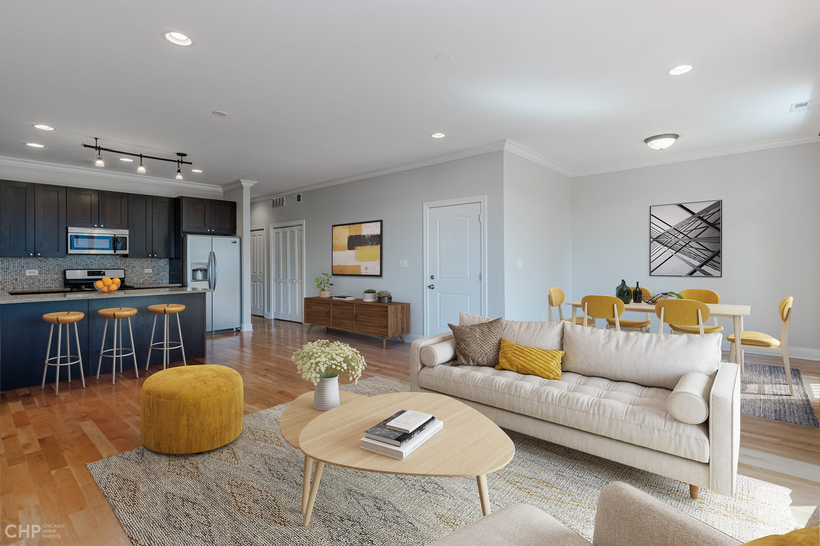 17 North Bishop Street, Unit 3 Chicago, IL 60607 - Photo 3 of 9 a living room with furniture and kitchen view