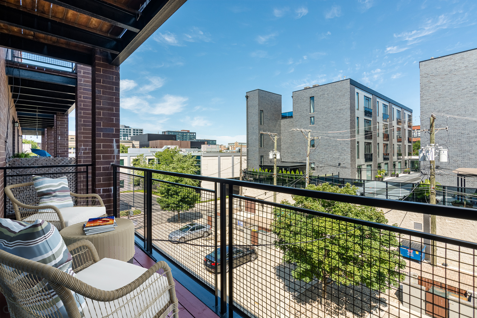 17 North Bishop Street, Unit 3 Chicago, IL 60607 - Photo 8 of 9 a city view from a balcony
