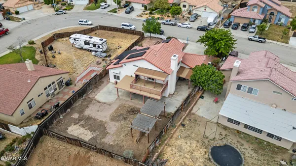 an aerial view of a residential apartment building with a front door
