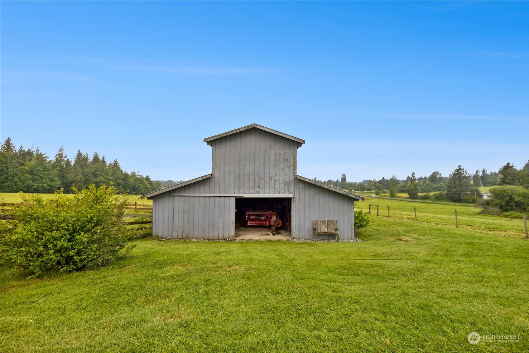 999 Mountain View Road Ferndale, WA 98248 - Photo 3 of 13 a view of a house with a yard and a large tree
