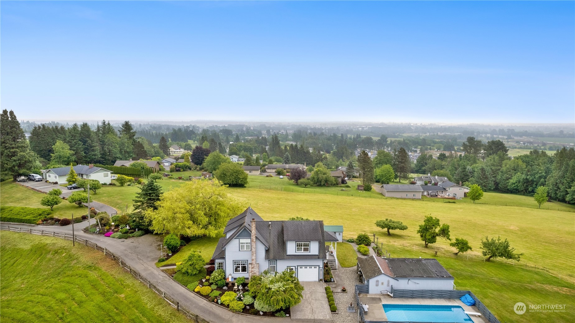 999 Mountain View Road Ferndale, WA 98248 - Photo 9 of 13 an aerial view of a house with a garden