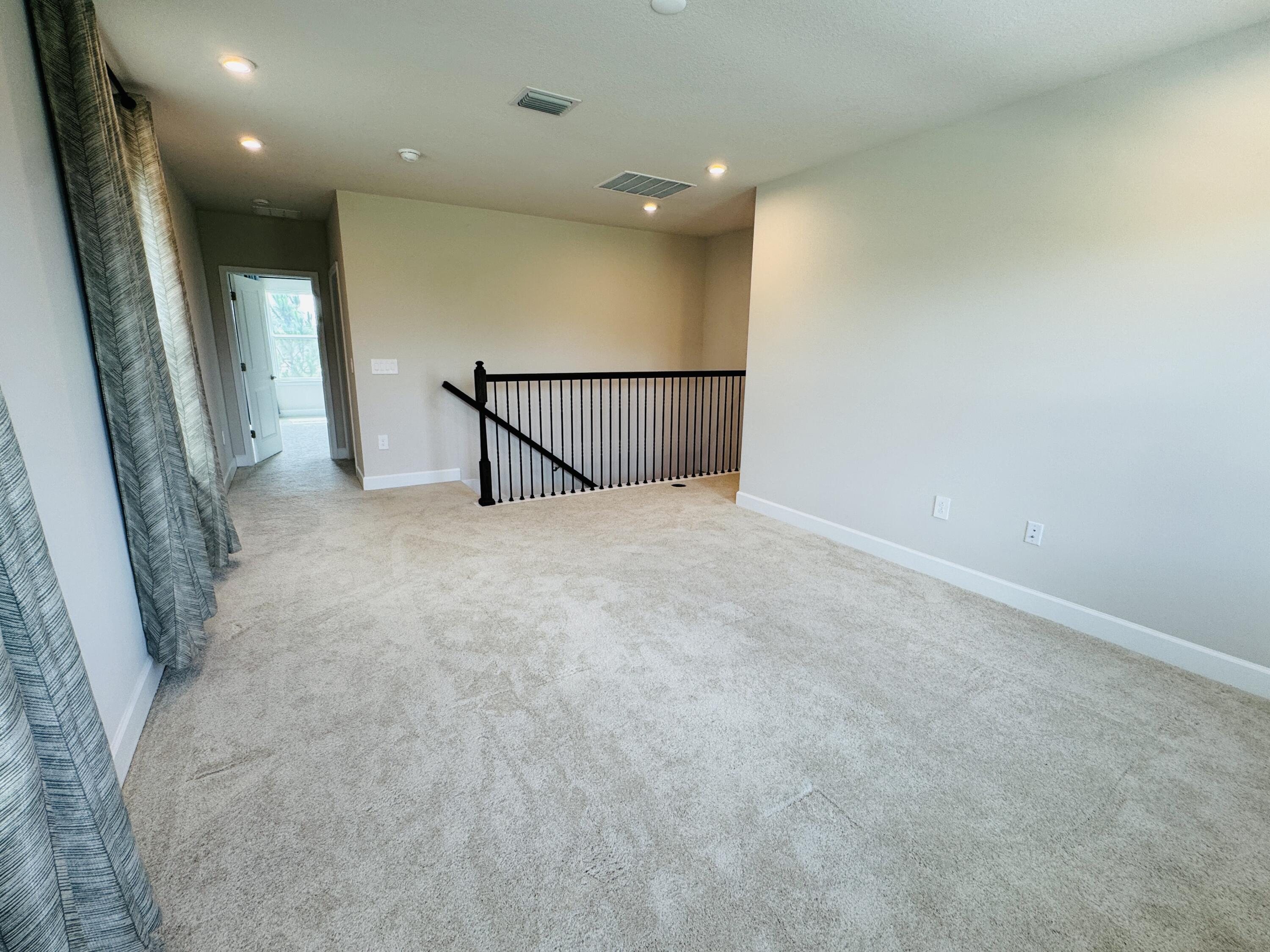 163 Southwest Pomeroy Street Stuart, FL 34997 - Photo 26 of 52 a view of an empty room