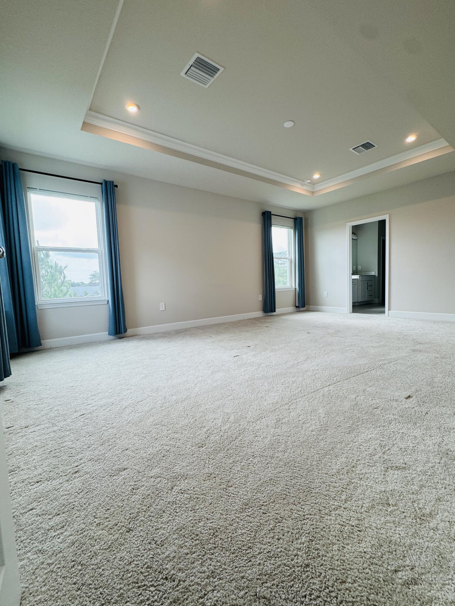 163 Southwest Pomeroy Street Stuart, FL 34997 - Photo 29 of 52 a view of an empty room with window and fireplace