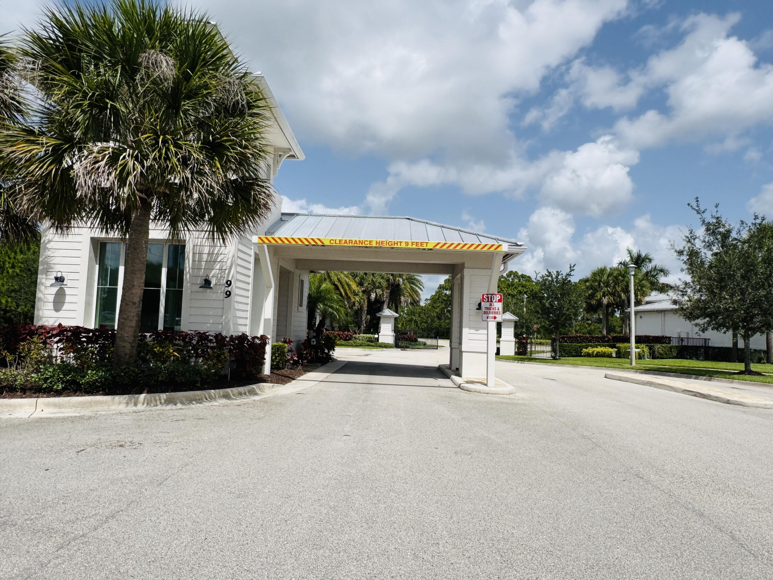 163 Southwest Pomeroy Street Stuart, FL 34997 - Photo 3 of 52 a view of a house with backyard and porch