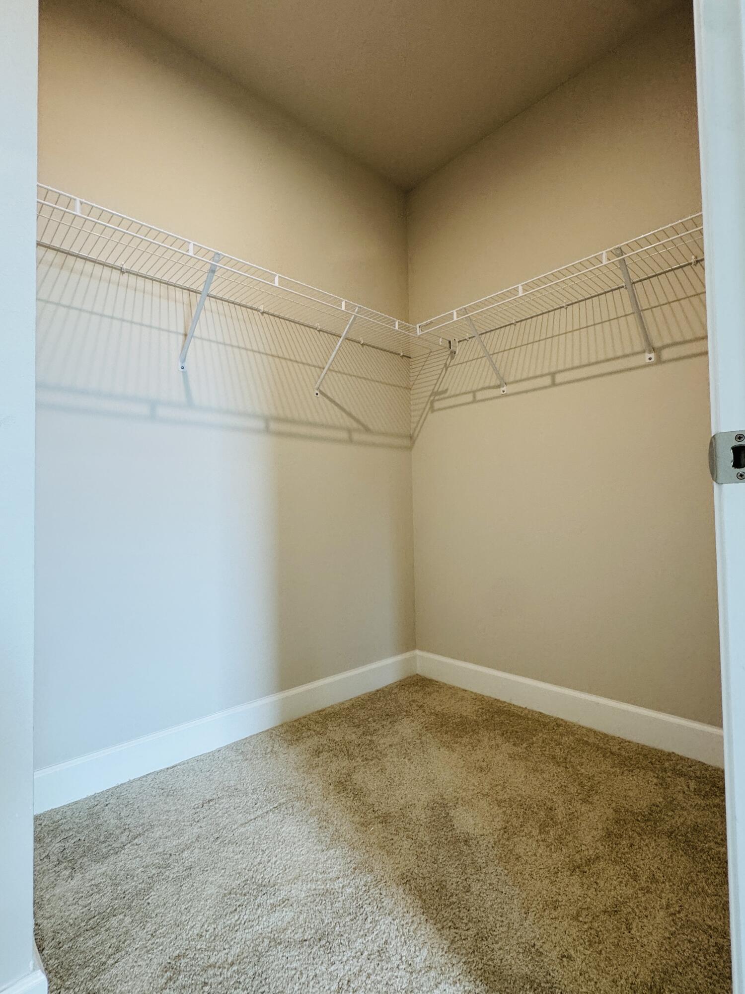 163 Southwest Pomeroy Street Stuart, FL 34997 - Photo 31 of 52 a view of a room with racks on the wall