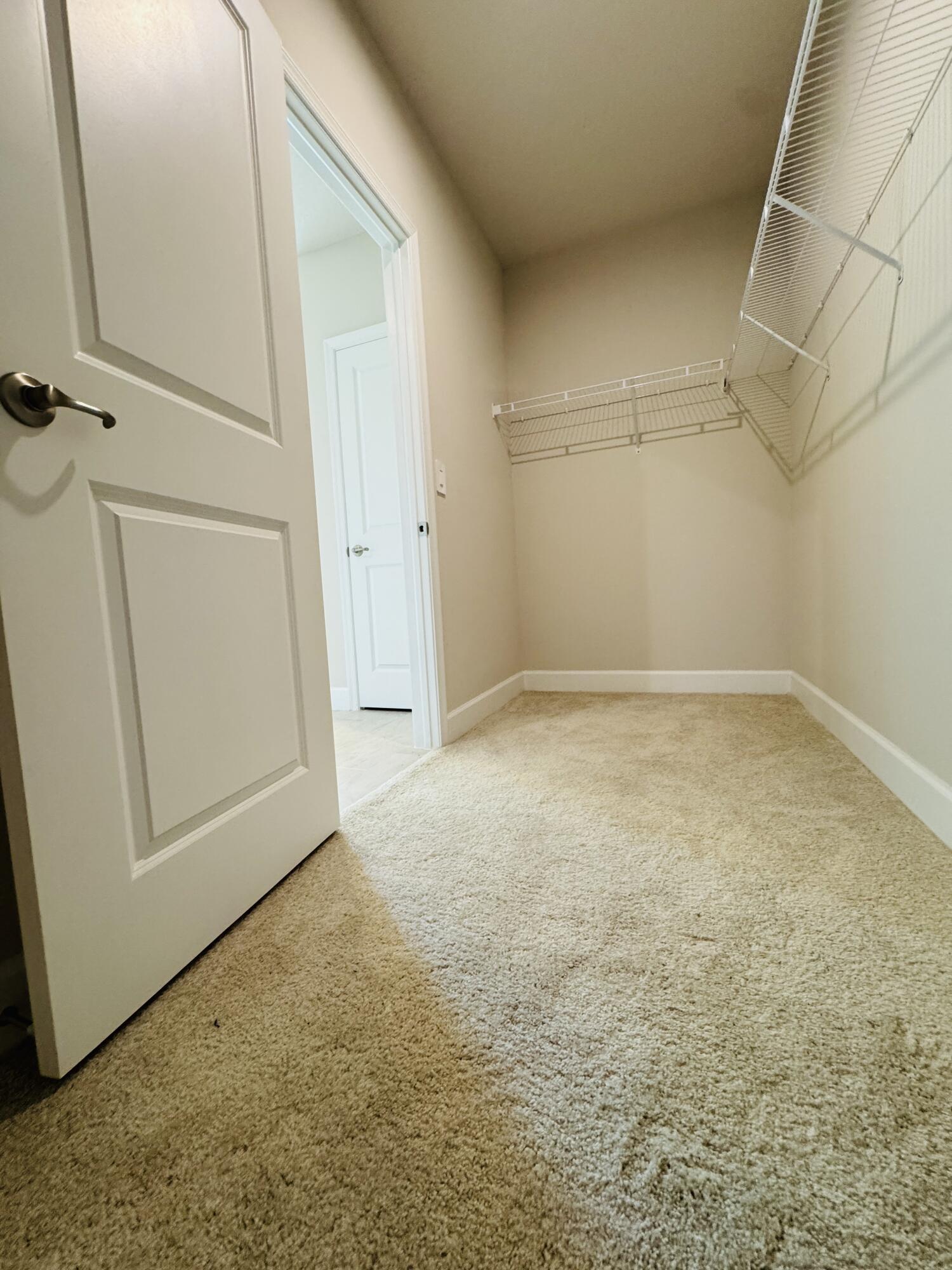 163 Southwest Pomeroy Street Stuart, FL 34997 - Photo 32 of 52 an empty room with windows