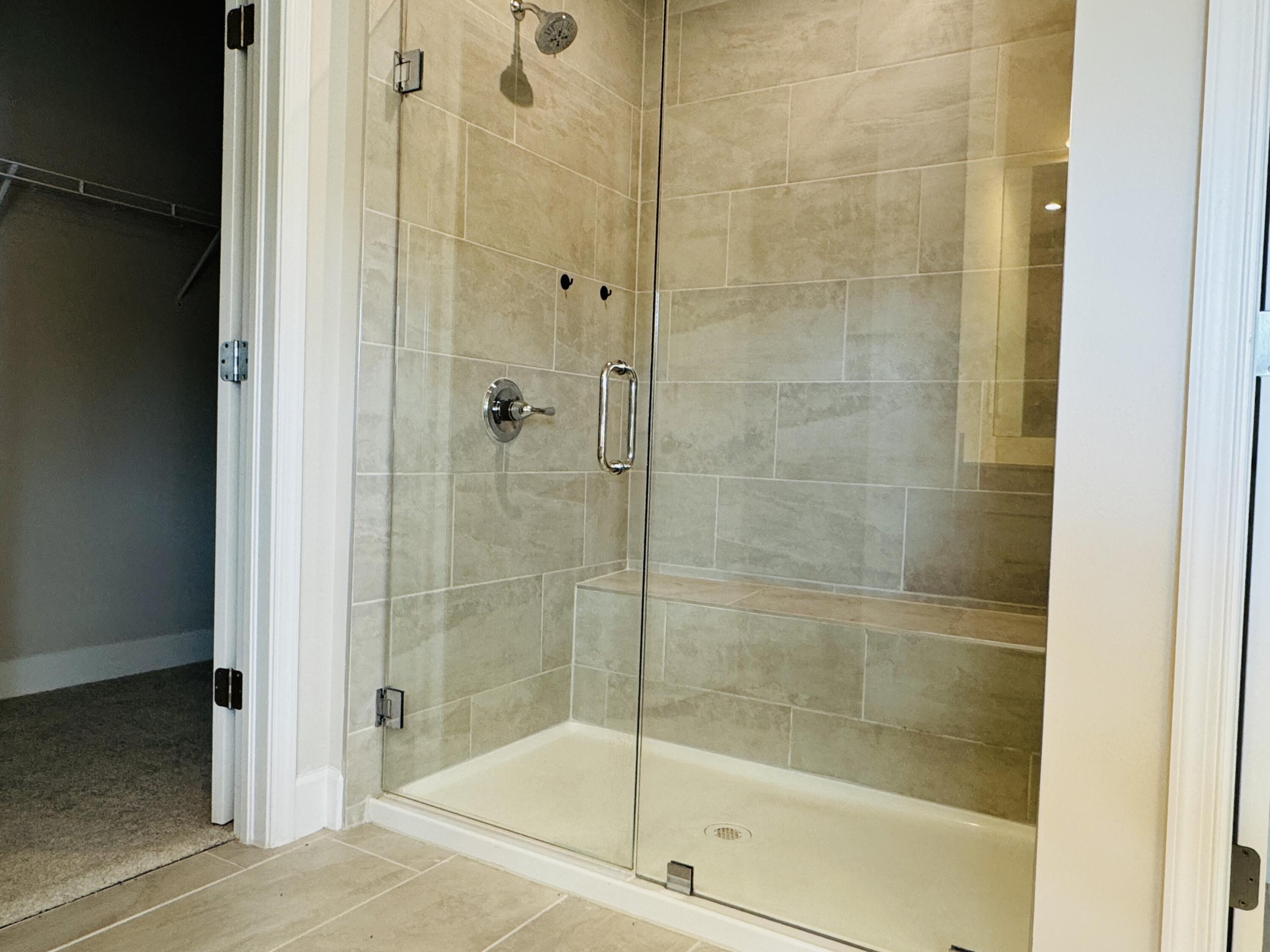 163 Southwest Pomeroy Street Stuart, FL 34997 - Photo 36 of 52 a bathroom with a shower