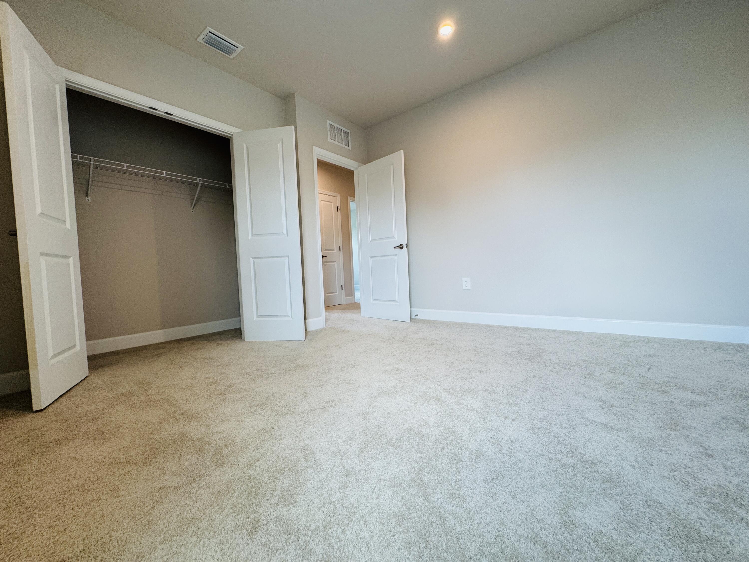 163 Southwest Pomeroy Street Stuart, FL 34997 - Photo 44 of 52 an empty room with closet area