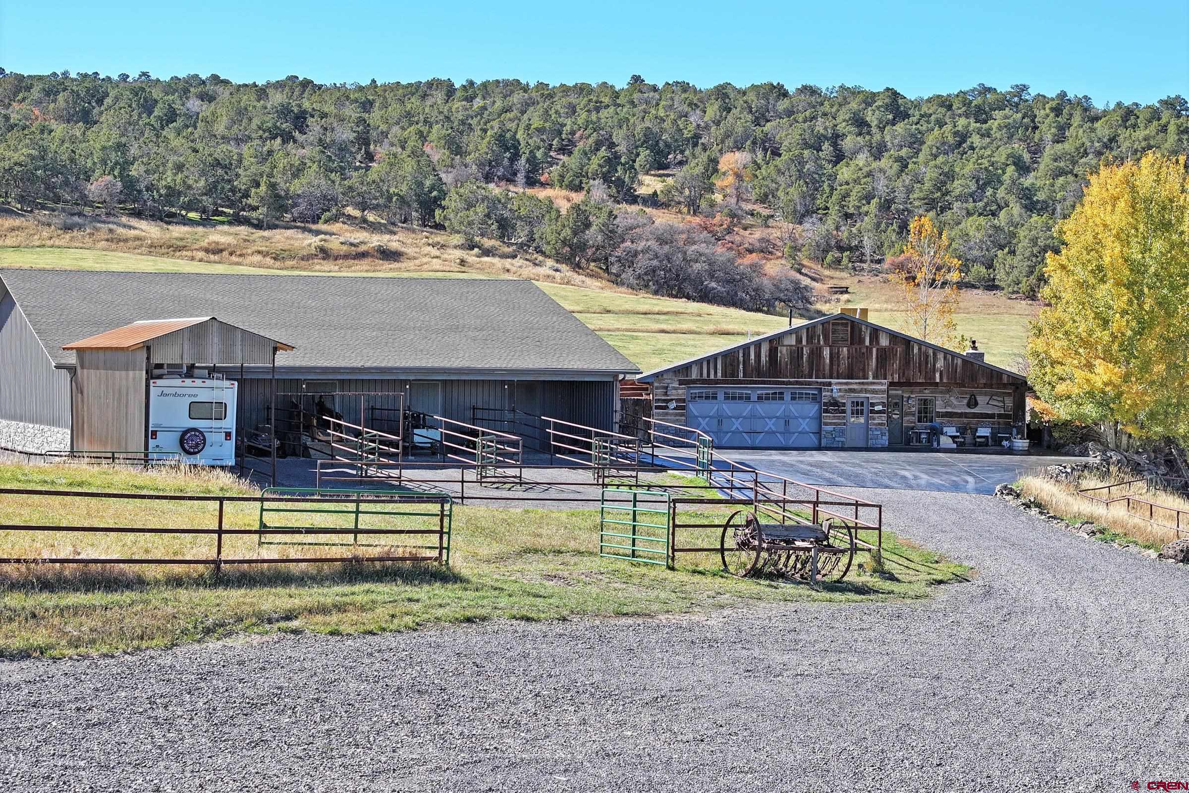 10497 54 7/10 Road Molina, CO 81646 - Photo 44 of 45 a view of a swimming pool with a lounge chairs