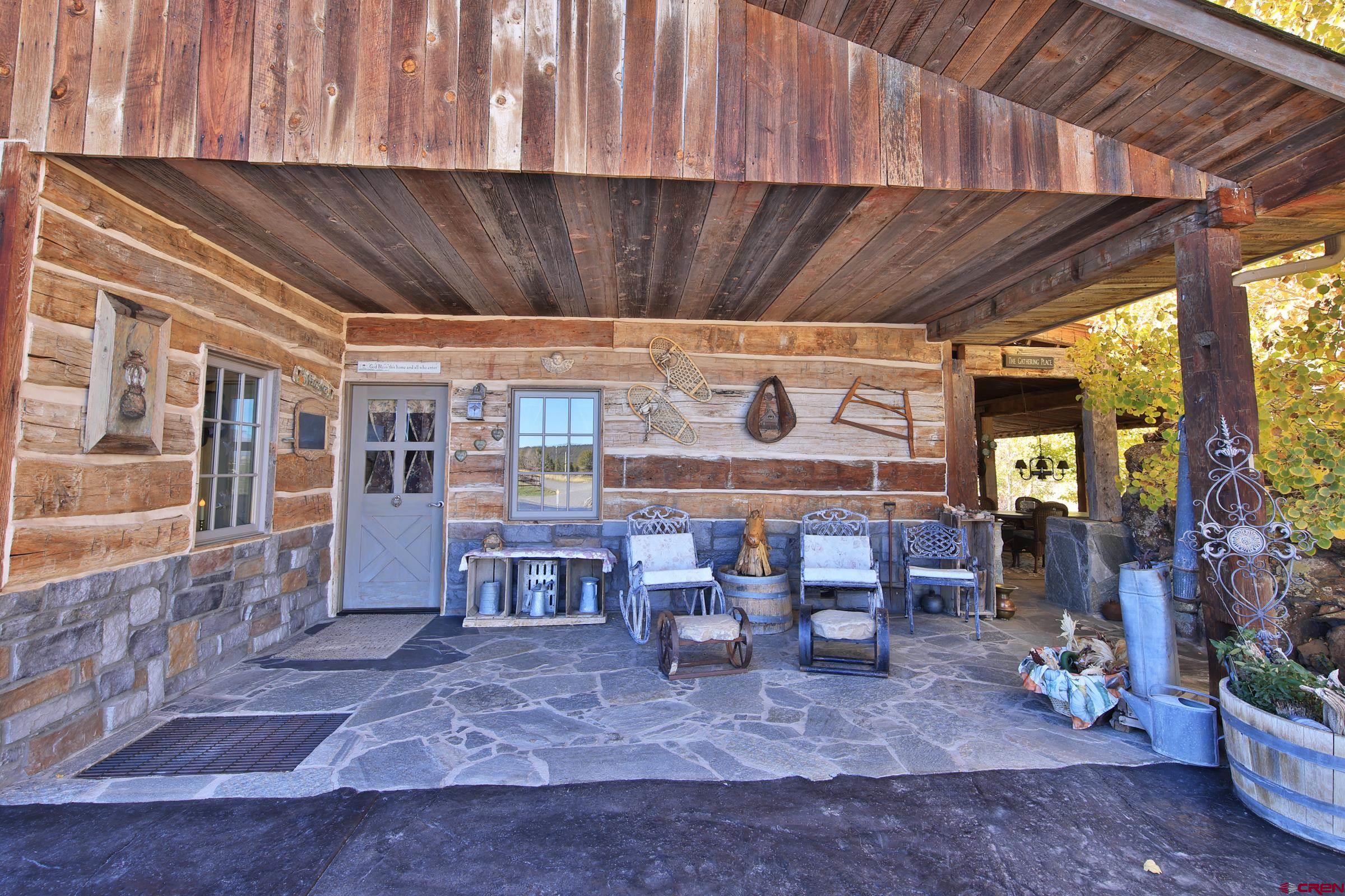 10497 54 7/10 Road Molina, CO 81646 - Photo 6 of 45 a room with lots of furniture and windows
