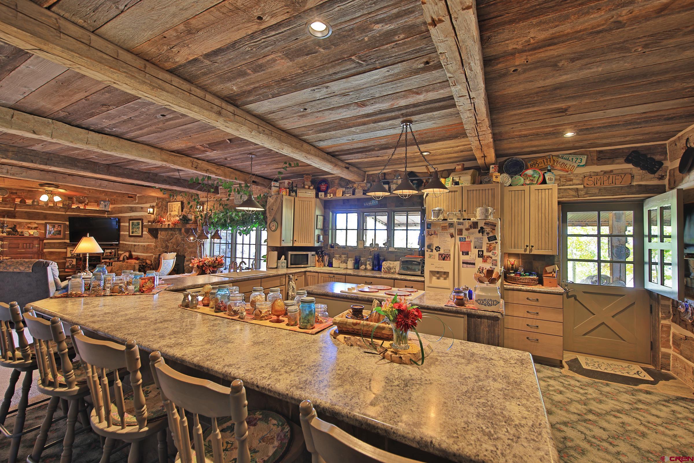 10497 54 7/10 Road Molina, CO 81646 - Photo 9 of 45 a view of a dining room with furniture
