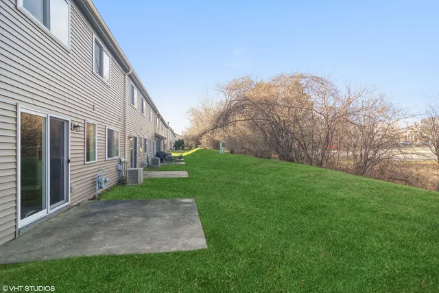 a view of a back yard of the house