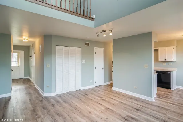 a view of a livingroom with wooden floor