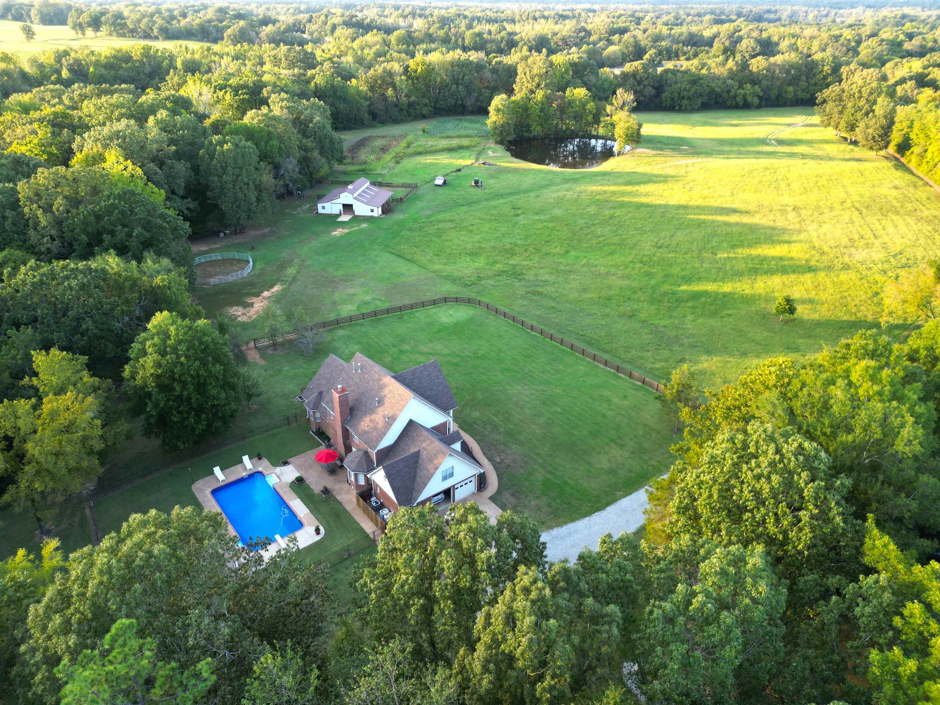 705 Old Solomon Mill Road Somerville, TN 38068 - Photo 2 of 40 an aerial view of a house with pool garden and swimming pool