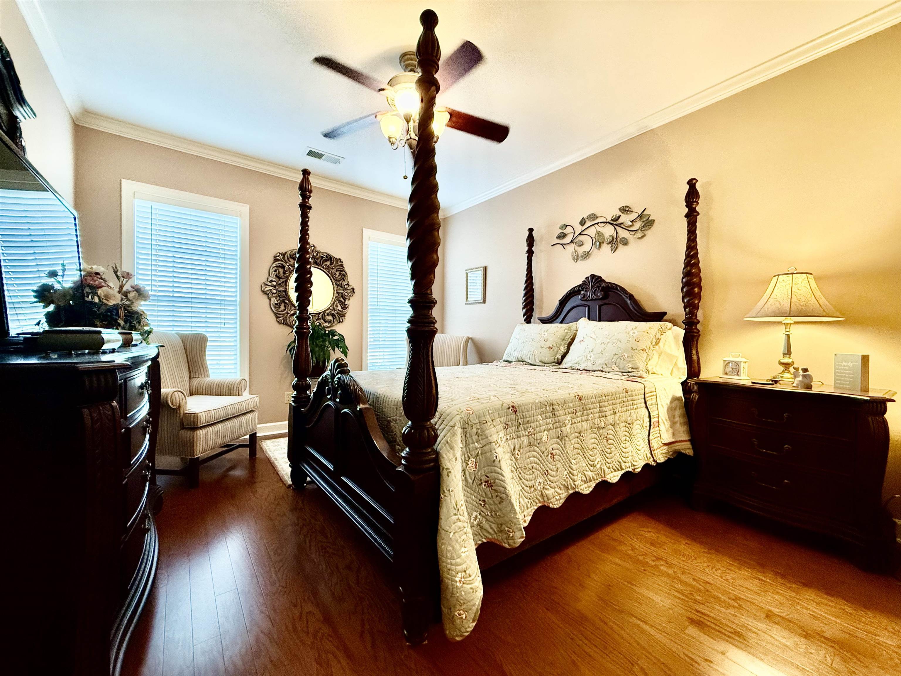 705 Old Solomon Mill Road Somerville, TN 38068 - Photo 22 of 40 a bedroom with a bed and wooden floor