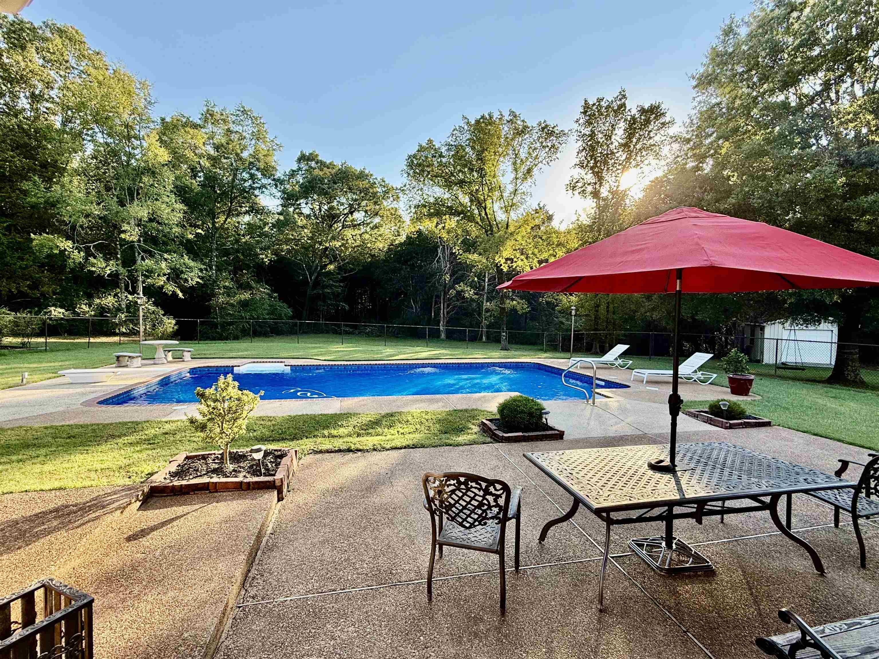 705 Old Solomon Mill Road Somerville, TN 38068 - Photo 28 of 40 a view of swimming pool with outdoor seating