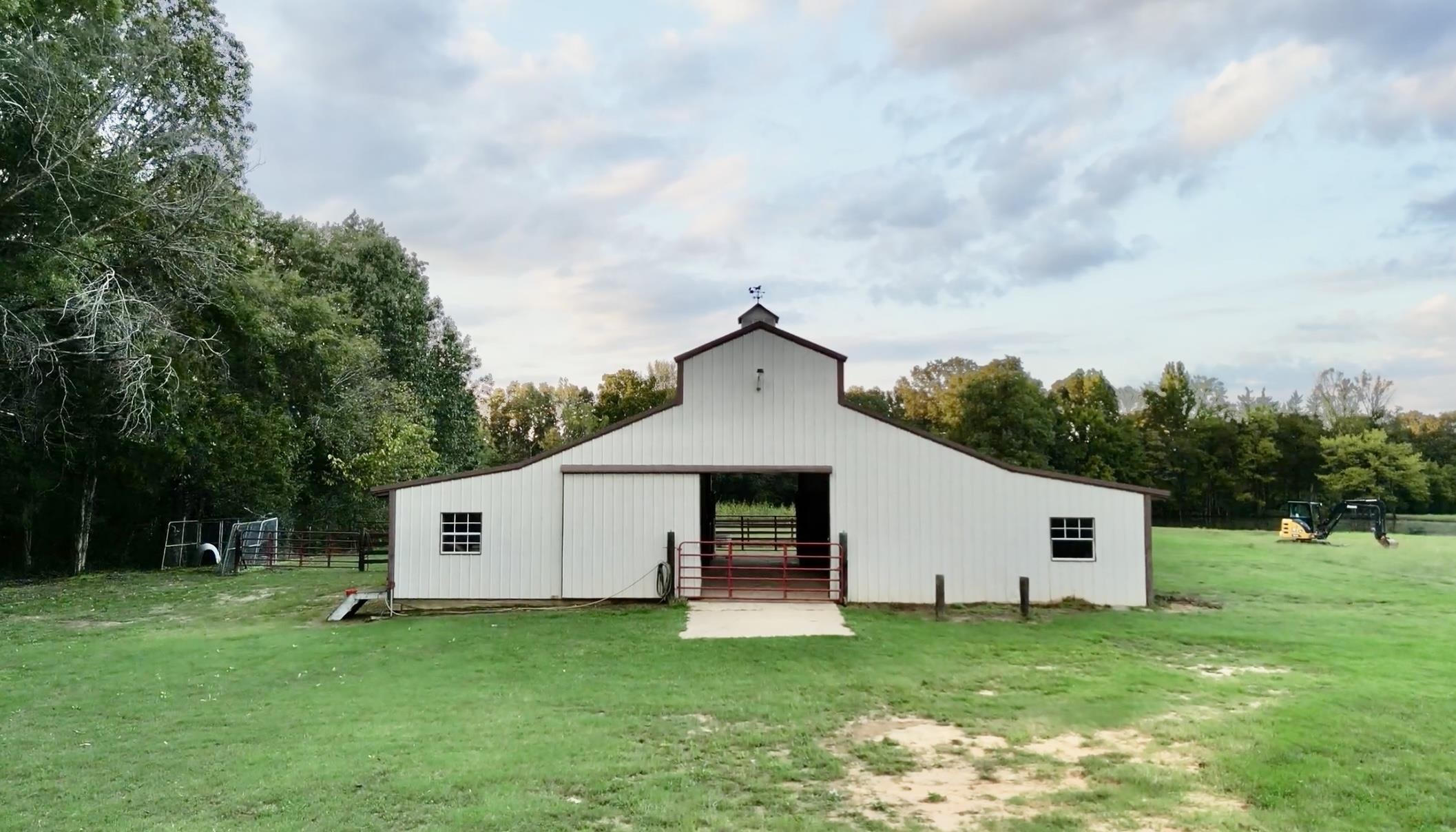 705 Old Solomon Mill Road Somerville, TN 38068 - Photo 35 of 40 a view of a house with backyard and garden