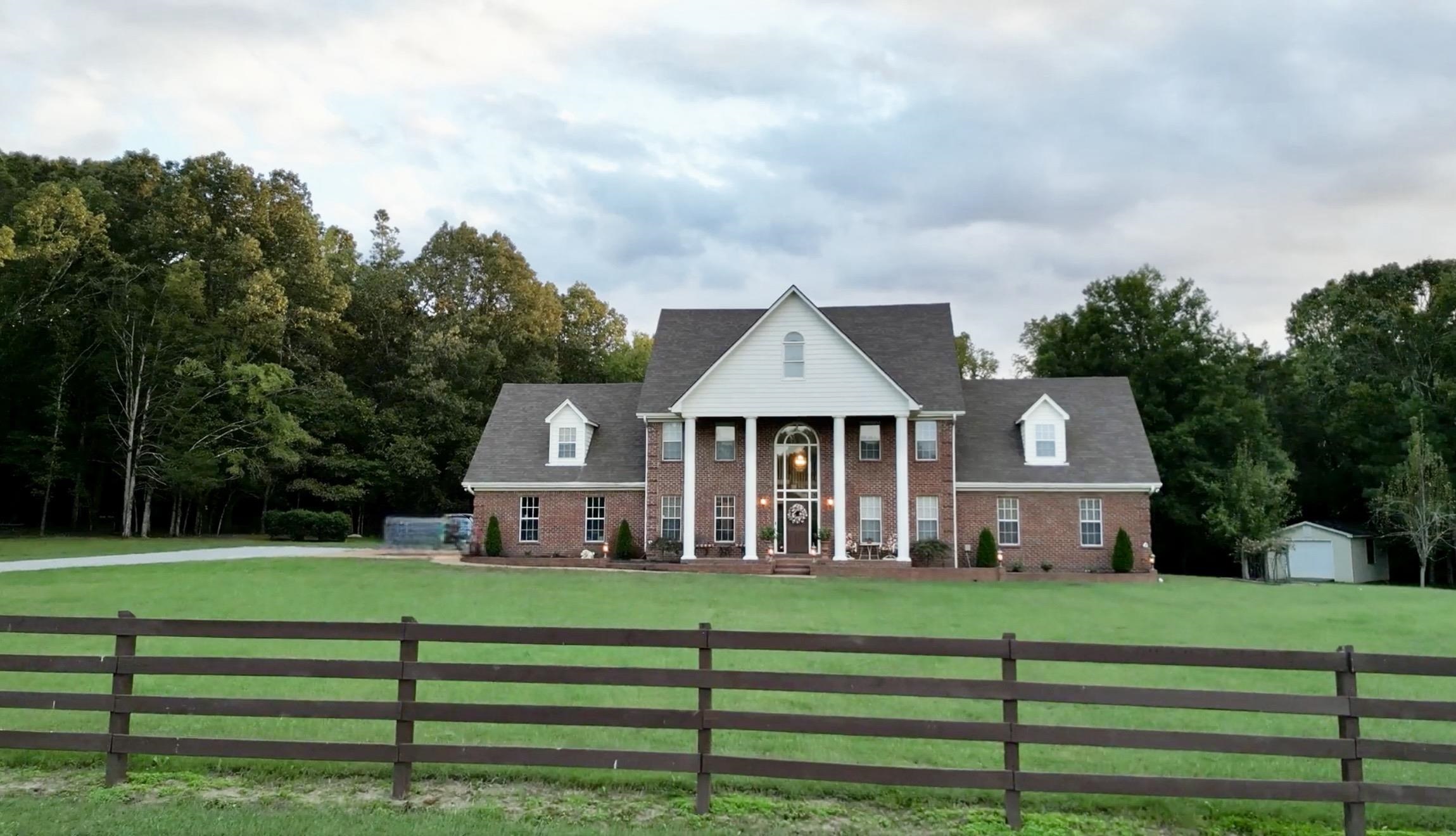 705 Old Solomon Mill Road Somerville, TN 38068 - Photo 4 of 40 a front view of a house with a yard