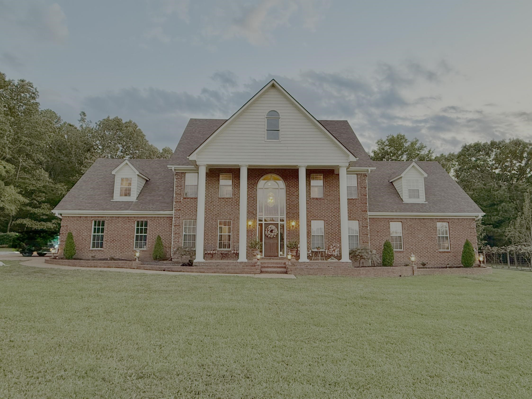 705 Old Solomon Mill Road Somerville, TN 38068 - Photo 7 of 40 a front view of a house with a yard