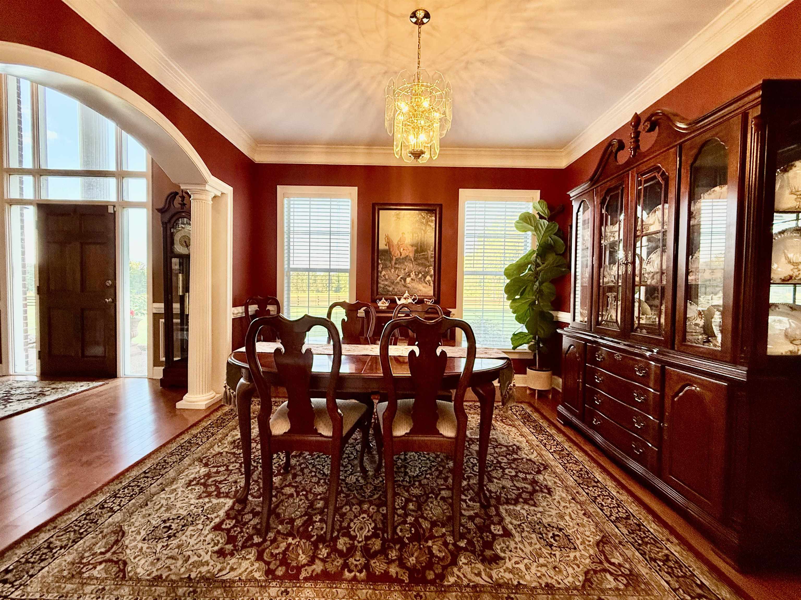 705 Old Solomon Mill Road Somerville, TN 38068 - Photo 10 of 40 a view of a dining room with furniture window and wooden floor