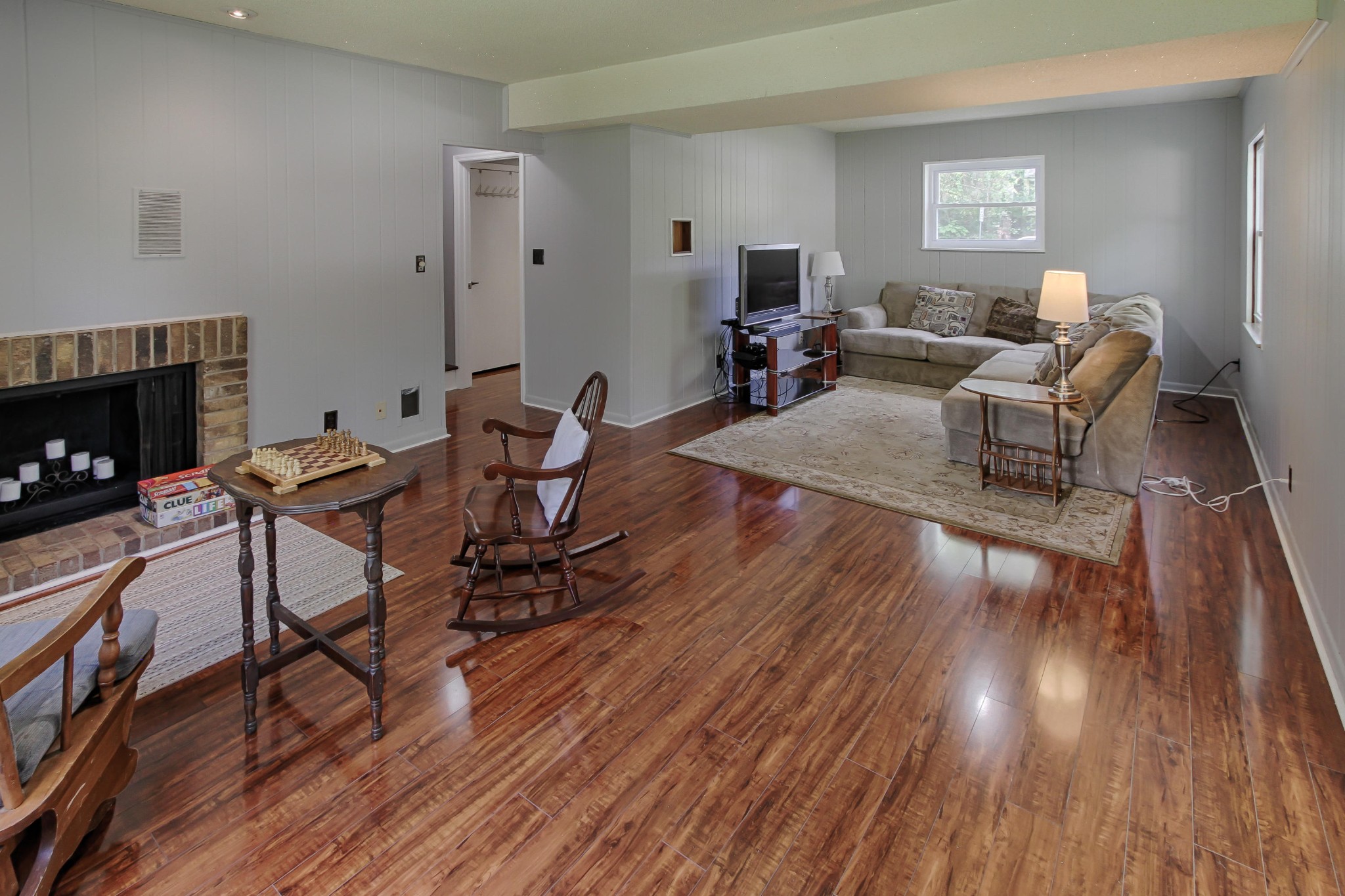 128 Culver Road Oak Ridge, TN 37830 - Photo 11 of 14 a living room with furniture and a wooden floor