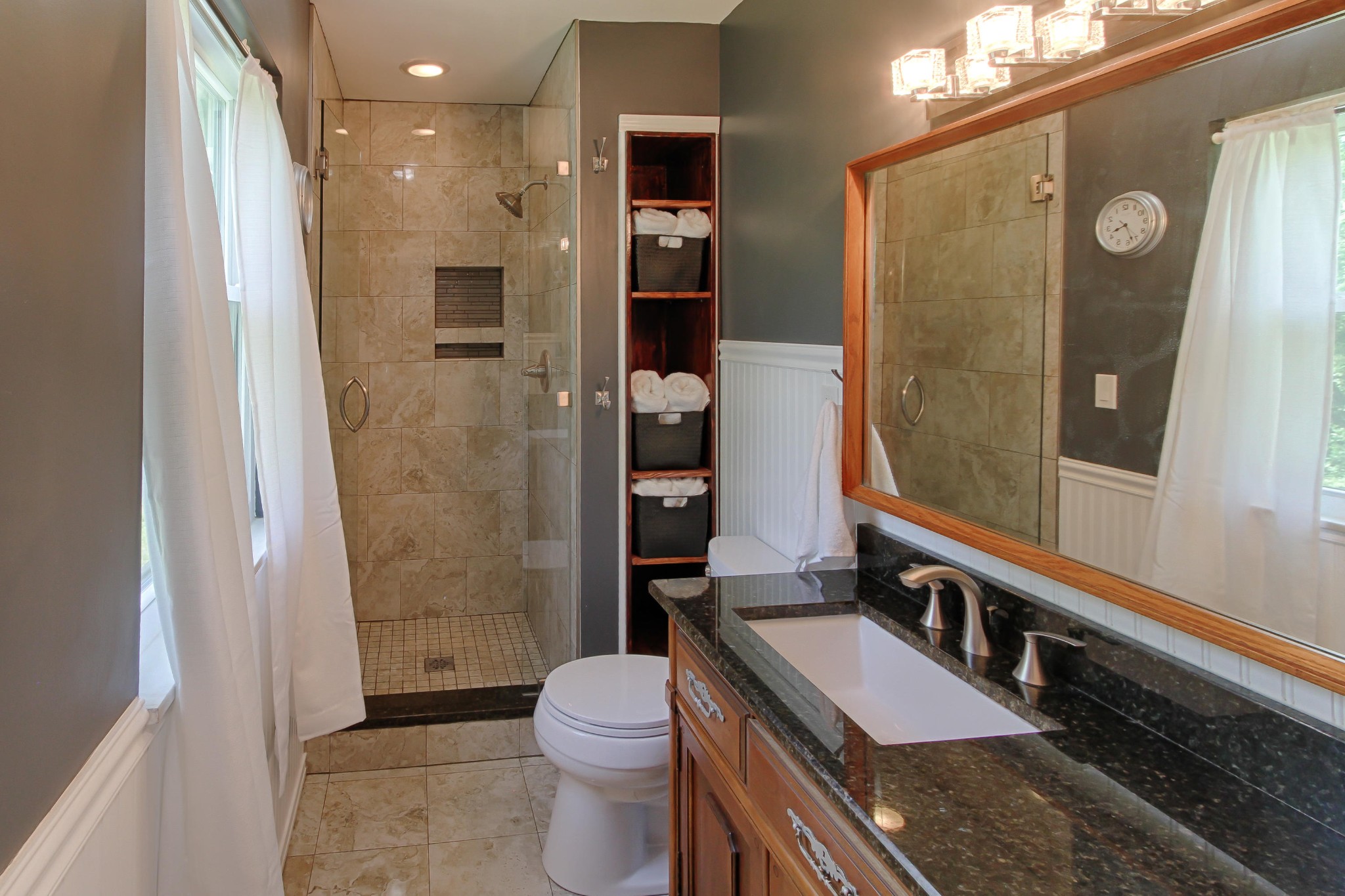 128 Culver Road Oak Ridge, TN 37830 - Photo 8 of 14 a bathroom with a toilet a sink and shower