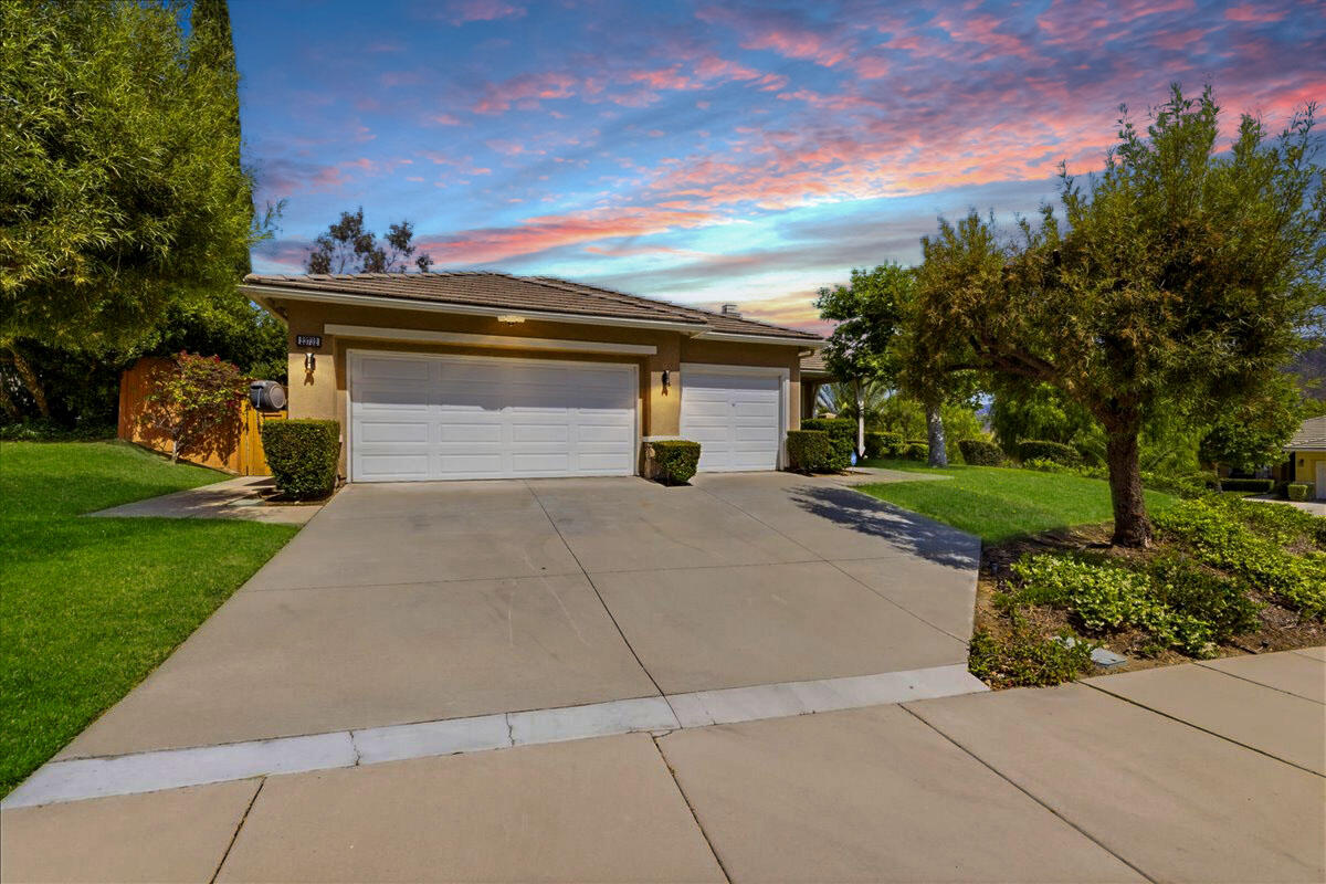 23732 Bella Vista Road Corona, CA 92883 - Photo 1 of 49 a view of a street with a house in the background