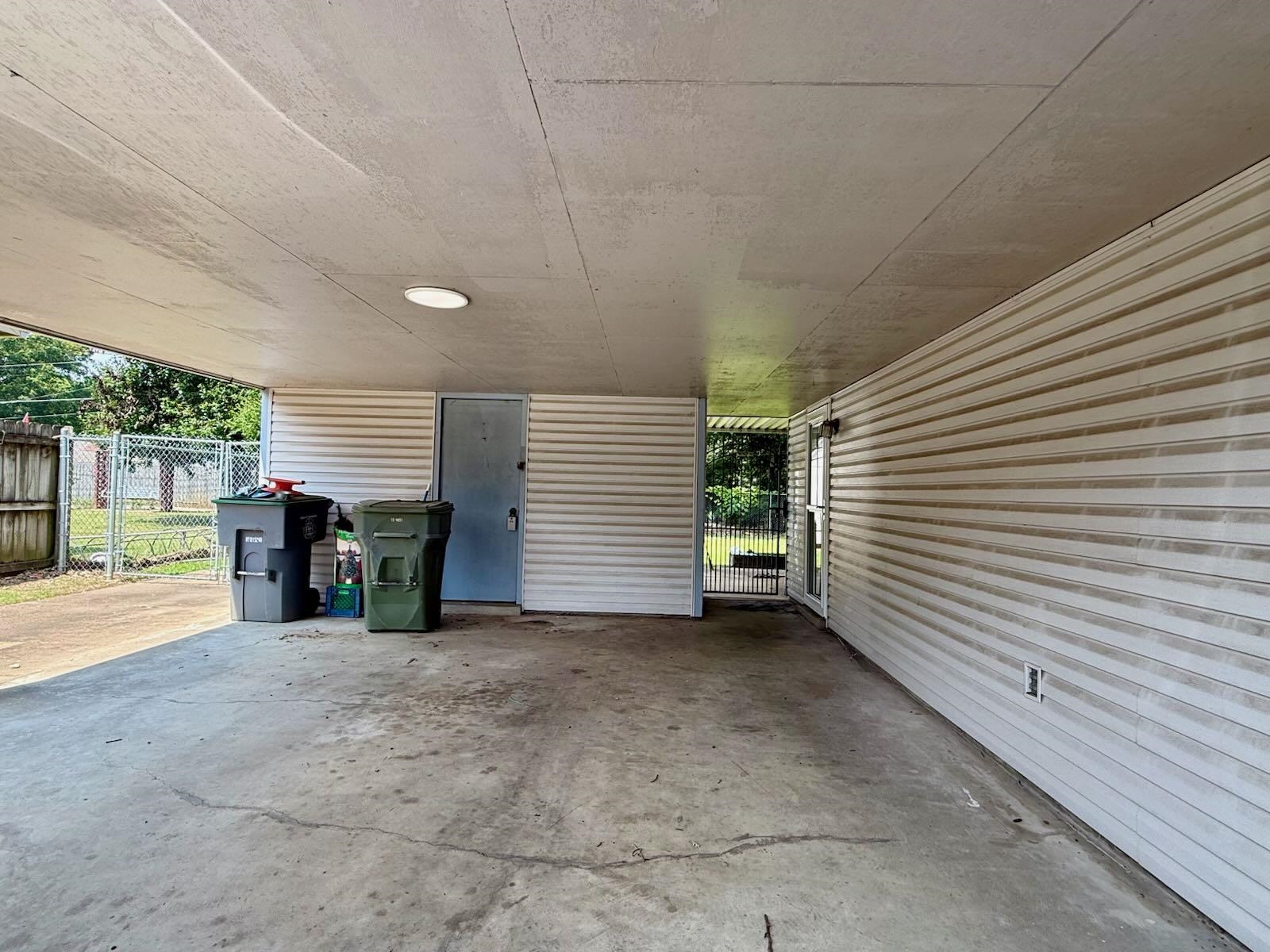 2151 Bartlett Road Memphis, TN 38134 - Photo 22 of 27 View of patio featuring a carport
