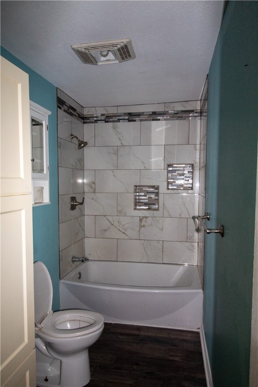 702 Jefferson Street Alice, TX 78332 - Photo 19 of 38 a bathroom with a toilet and a shower