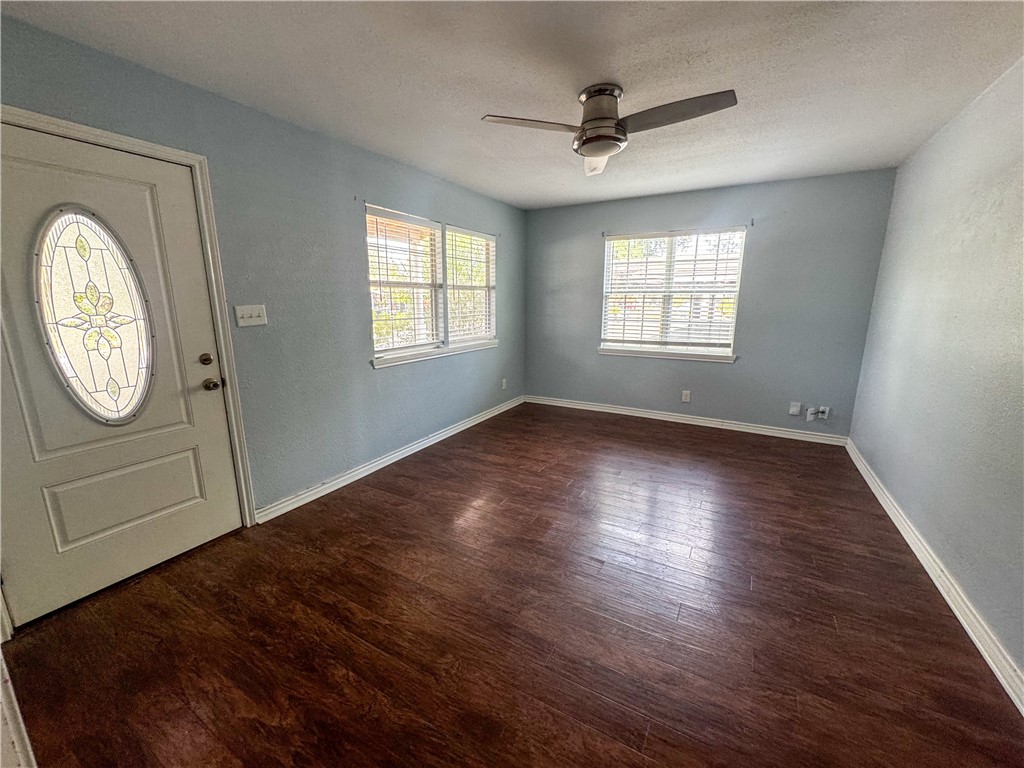 702 Jefferson Street Alice, TX 78332 - Photo 30 of 38 a view of empty room with wooden floor and fan