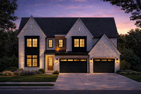 a front view of a house with yard