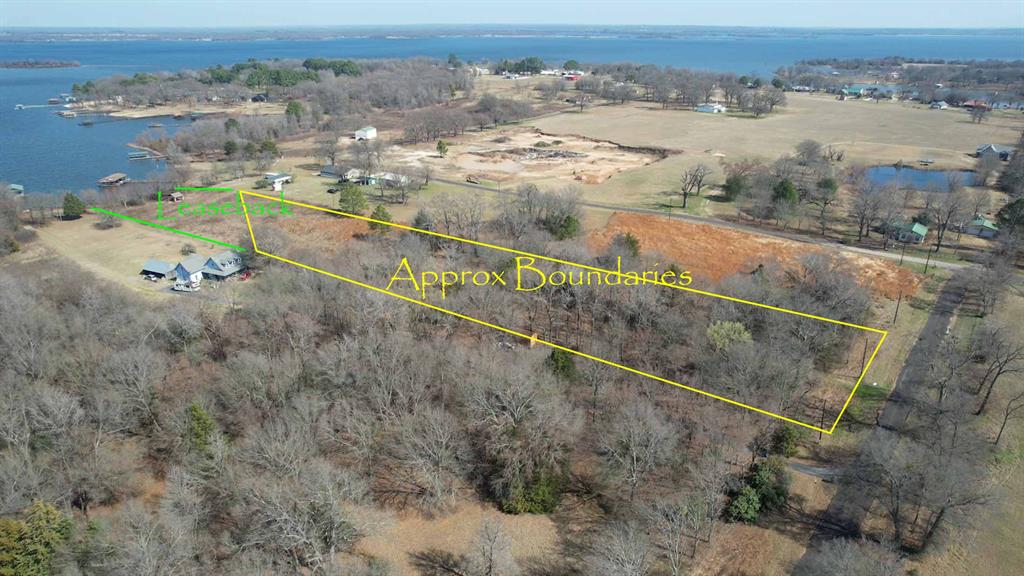 1575 County Road 1575 Alba, TX 75410 - Photo 4 of 14 an aerial view of residential houses with outdoor space and river