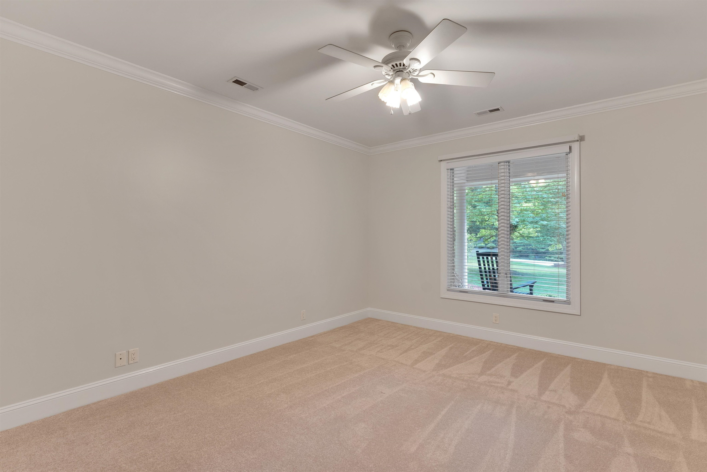 5204 Strathmore Drive Raleigh, NC 27613 - Photo 20 of 32 an empty room with a window