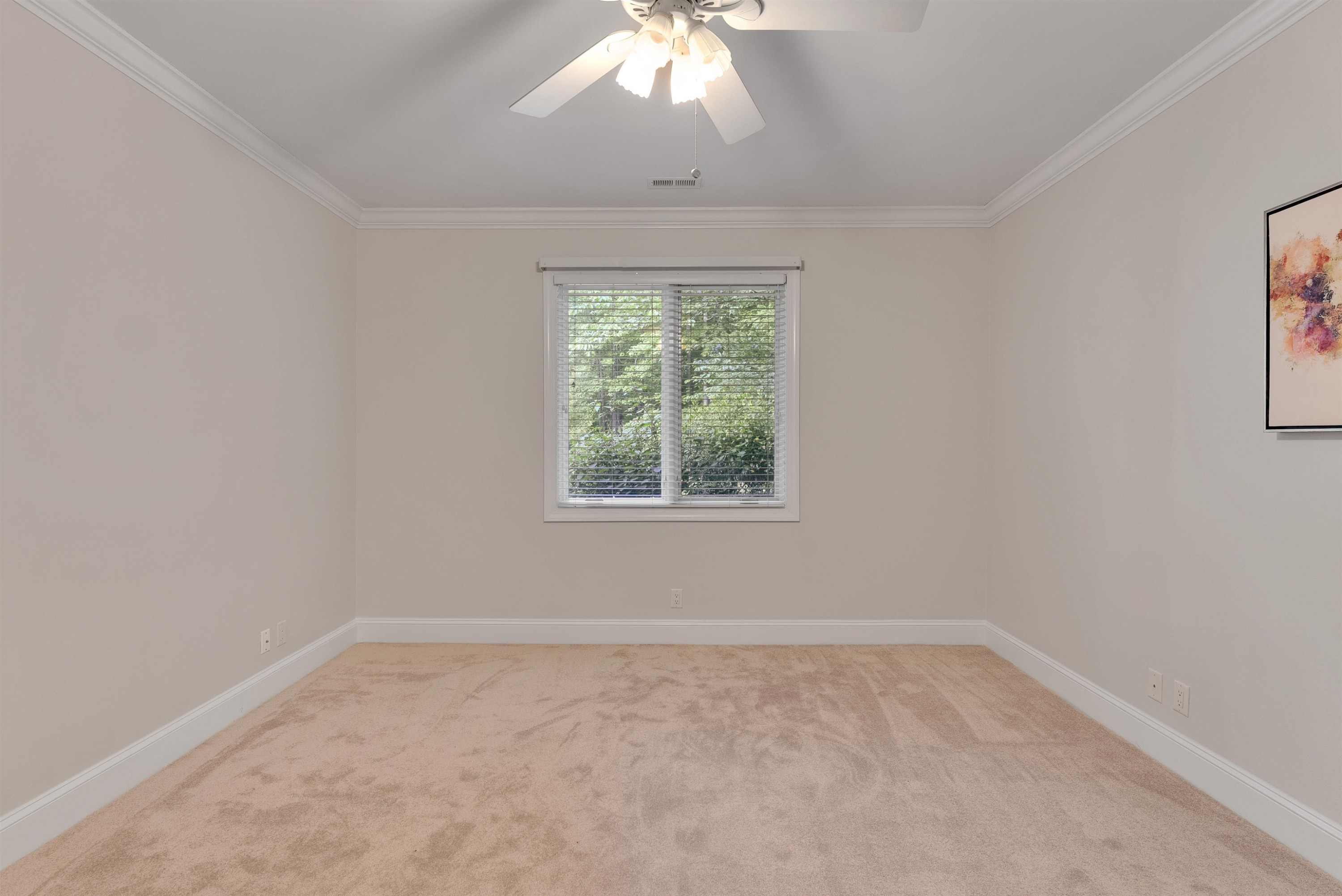 5204 Strathmore Drive Raleigh, NC 27613 - Photo 25 of 32 an empty room with a window