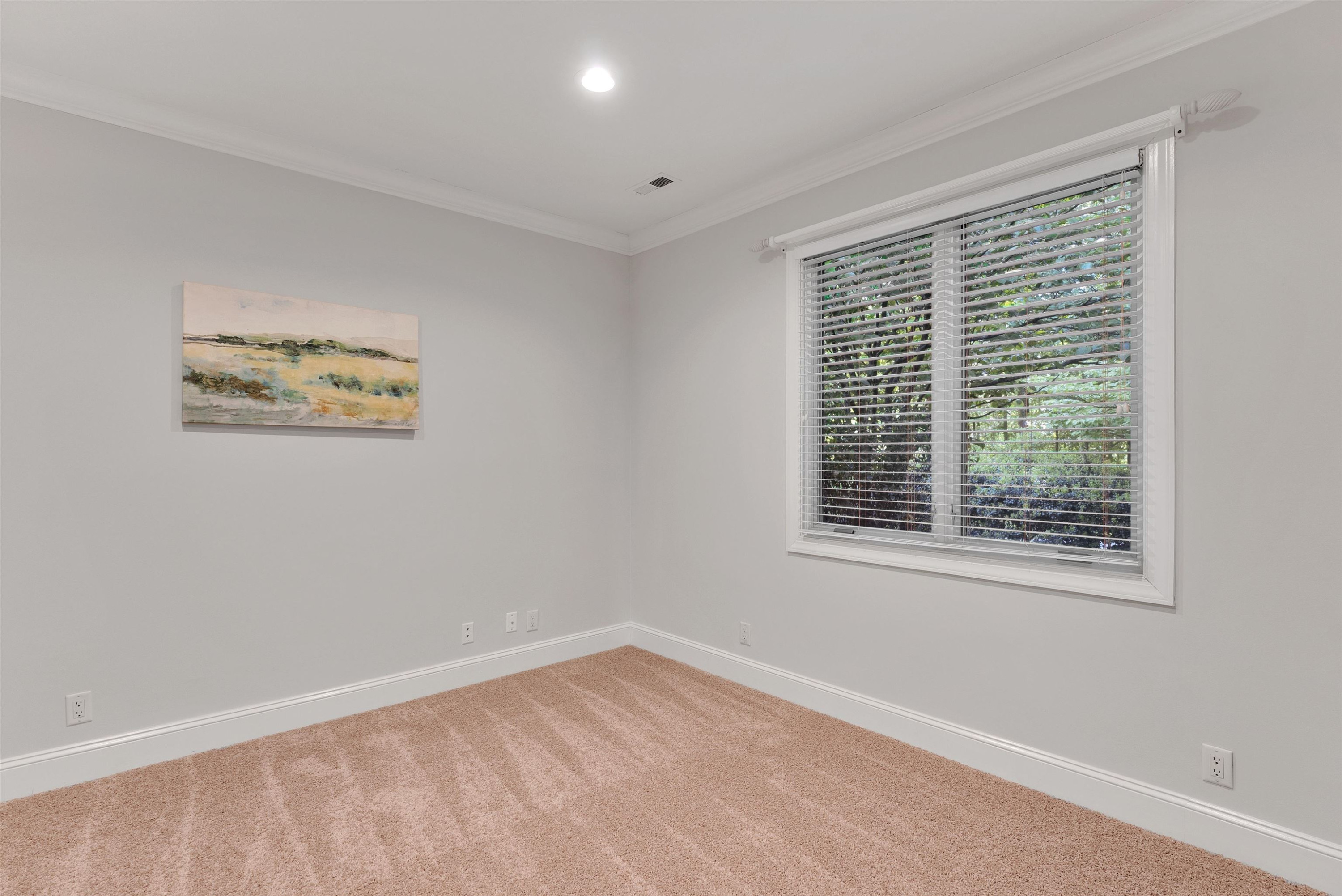 5204 Strathmore Drive Raleigh, NC 27613 - Photo 26 of 32 a view of an empty room with a window