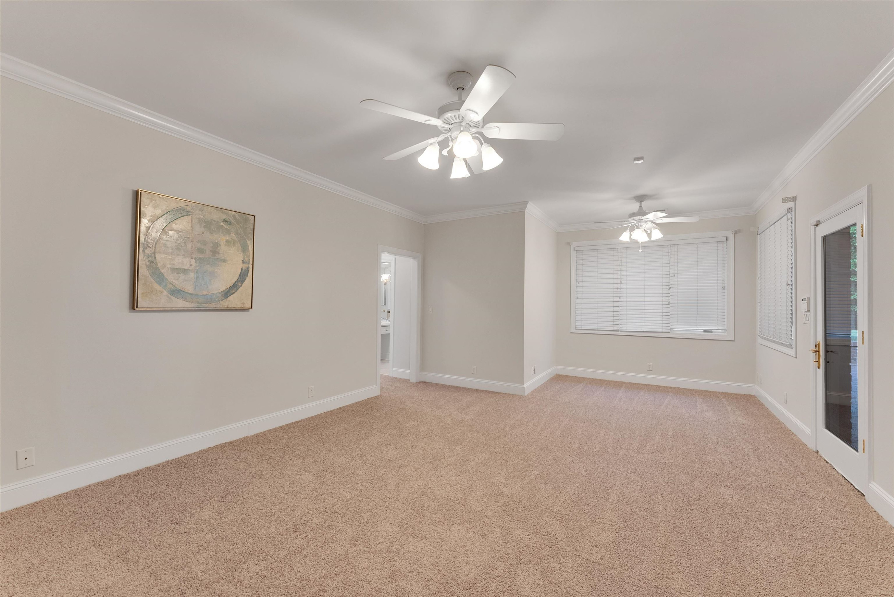 5204 Strathmore Drive Raleigh, NC 27613 - Photo 27 of 32 a view of an empty room with a window