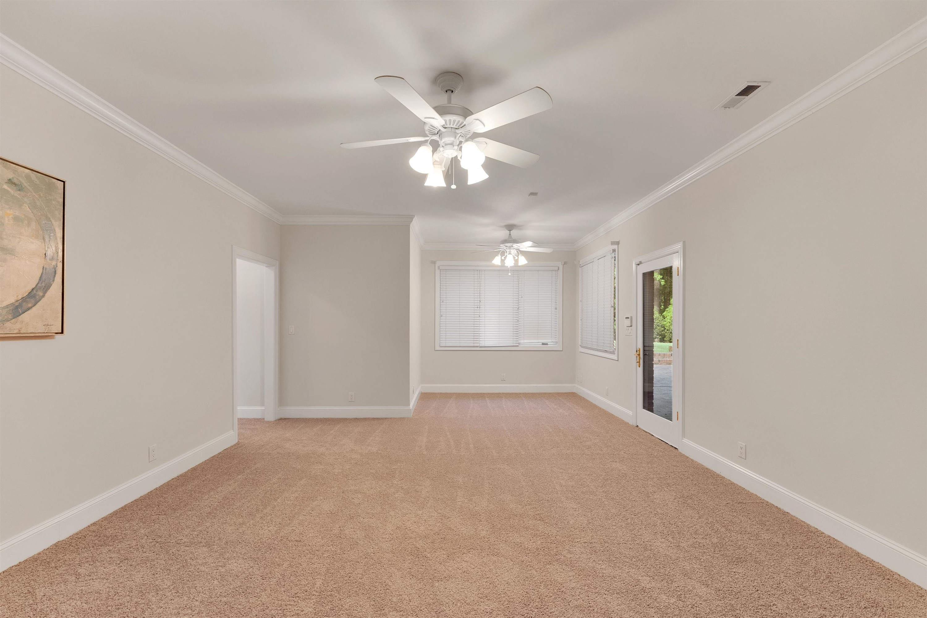5204 Strathmore Drive Raleigh, NC 27613 - Photo 28 of 32 a view of an empty room