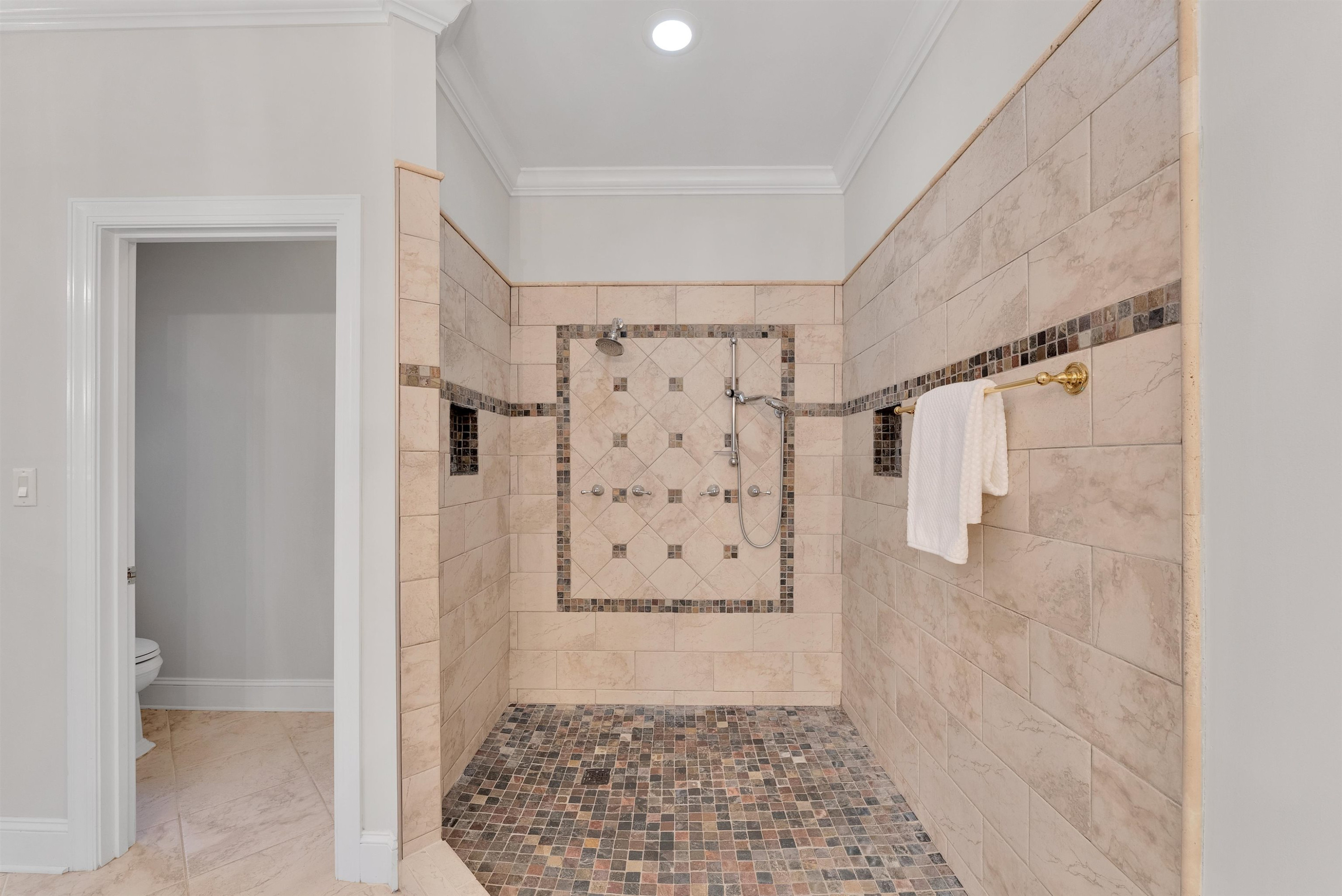 5204 Strathmore Drive Raleigh, NC 27613 - Photo 31 of 32 a view of a bathroom with a shower