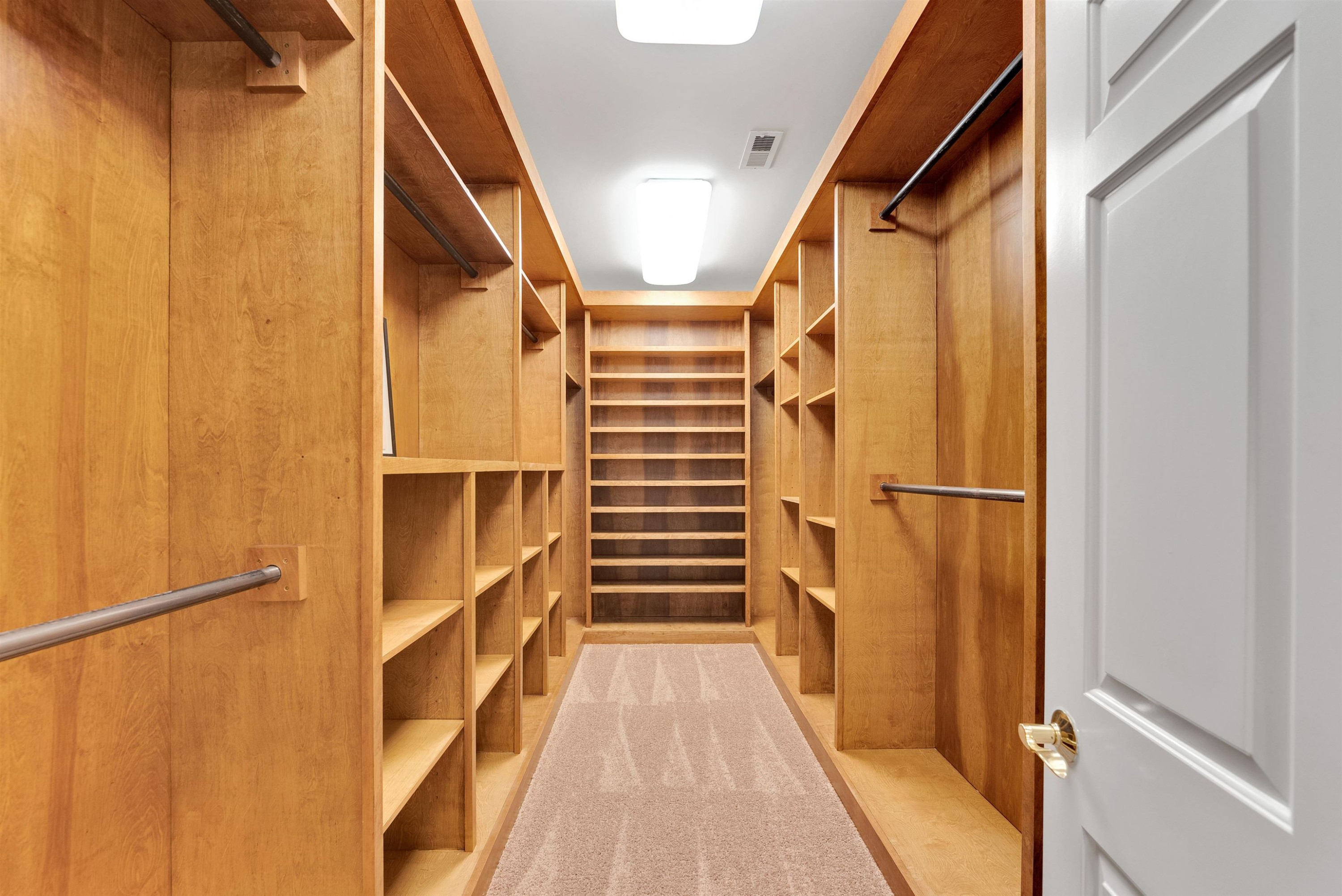 5204 Strathmore Drive Raleigh, NC 27613 - Photo 32 of 32 a view of walk in closet with empty racks