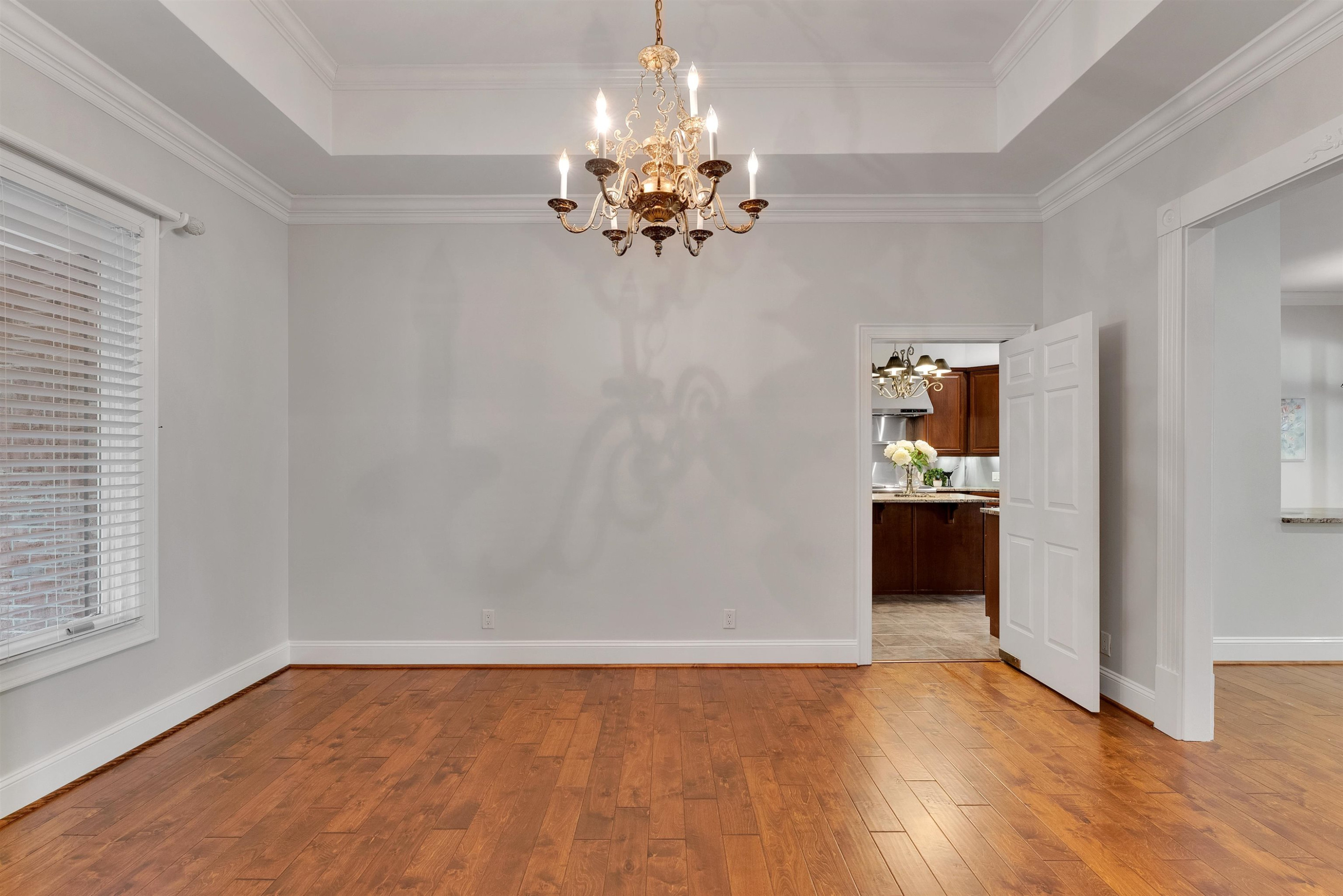 5204 Strathmore Drive Raleigh, NC 27613 - Photo 5 of 32 a view of a chandelier in a room