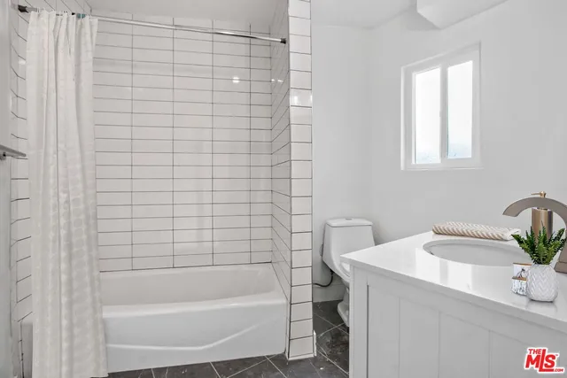 a bathroom with a sink and a bathtub