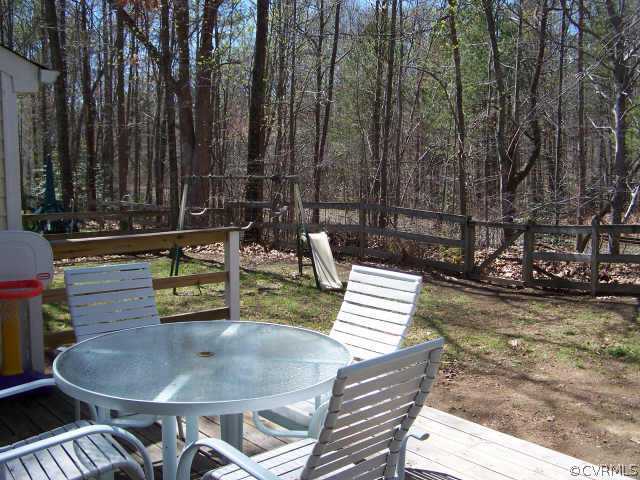 1430 Oldbury Road Midlothian, VA 23113 - Photo 8 of 10 a backyard of a house with outdoor seating