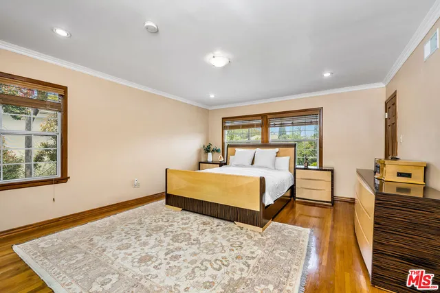 a bed room with a bed and a couch