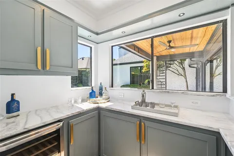 a bathroom with a sink and a window