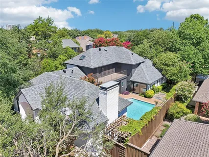 an aerial view of a house with a garden