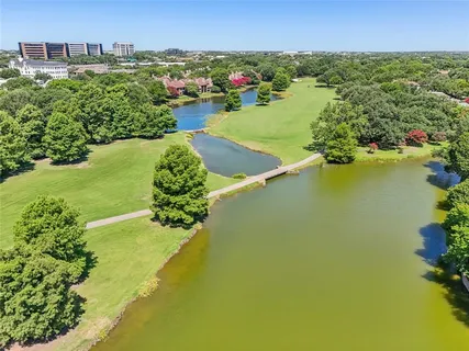 a view of a lake with a city