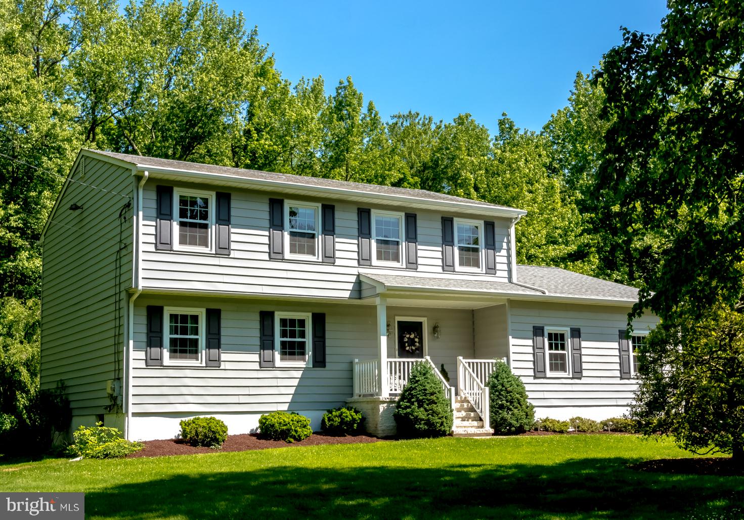 59 Tindall Road Trenton, NJ 08691 - Photo 4 of 76 a front view of a house with a yard
