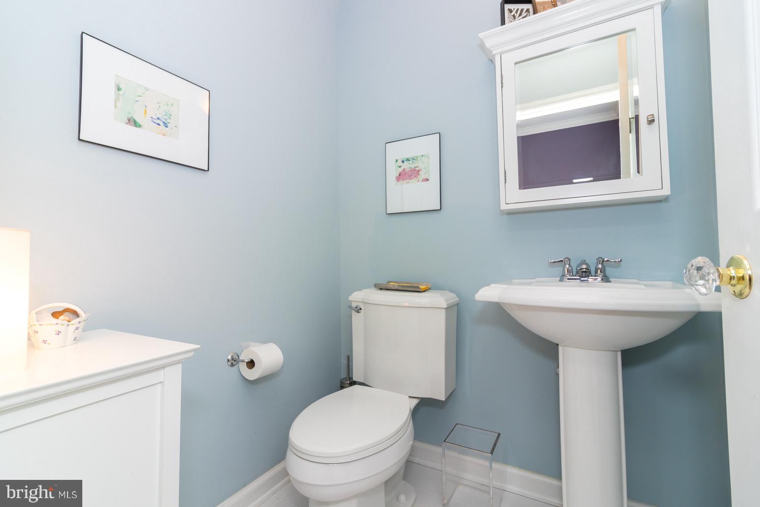 59 Tindall Road Trenton, NJ 08691 - Photo 39 of 76 a bathroom with a sink mirror and toilet