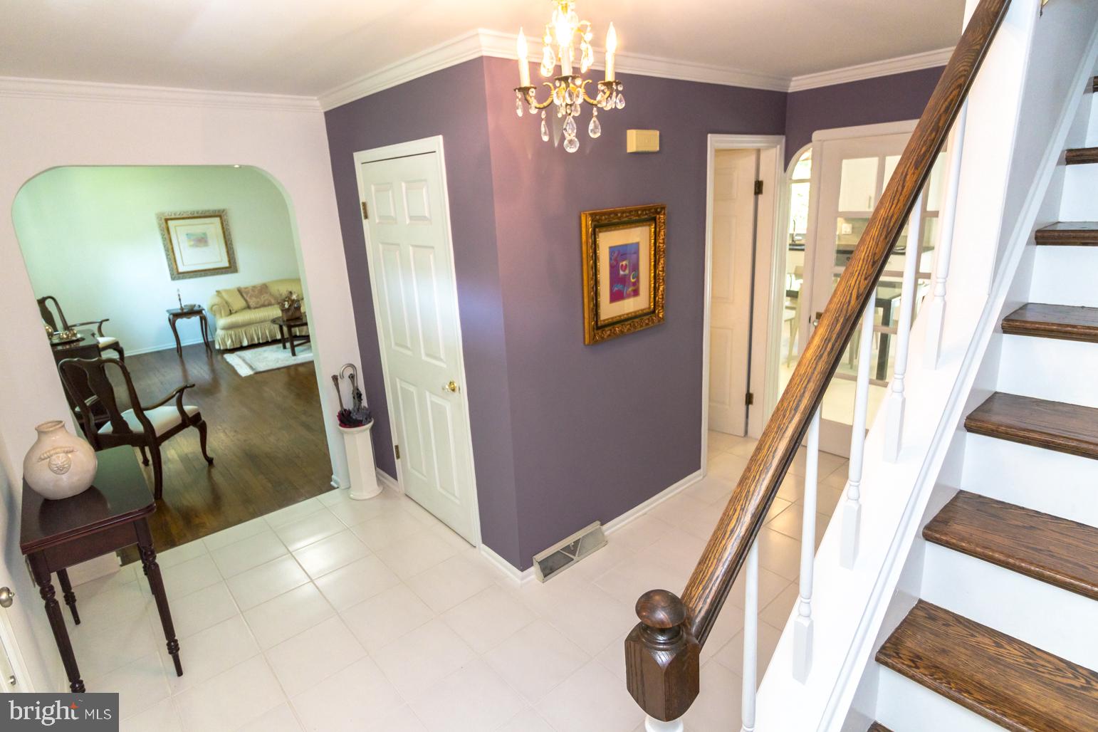 59 Tindall Road Trenton, NJ 08691 - Photo 41 of 76 a view of an entryway with wooden floor and a livingroom view