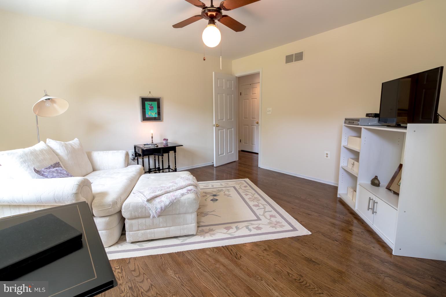 59 Tindall Road Trenton, NJ 08691 - Photo 48 of 76 a bedroom with a bed and a flat screen tv